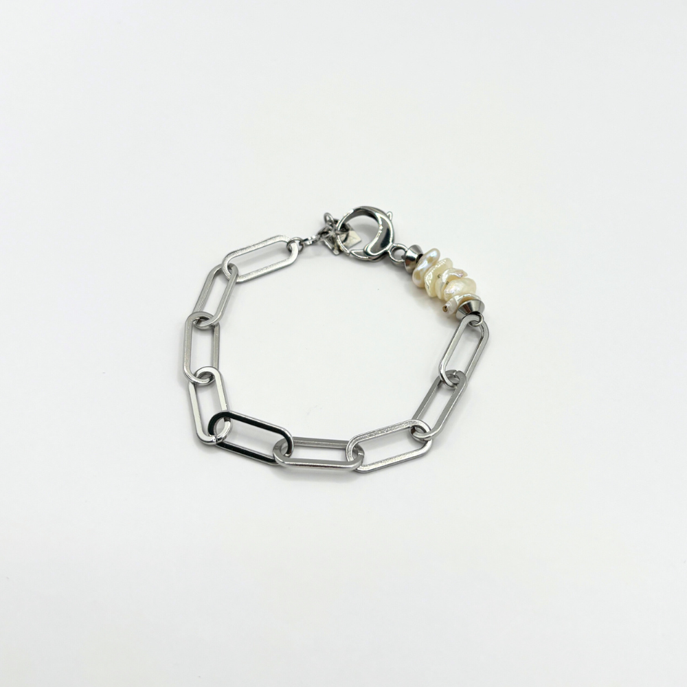 Schakelarmbandje met parelschelpen