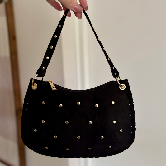 Suède tas met studs