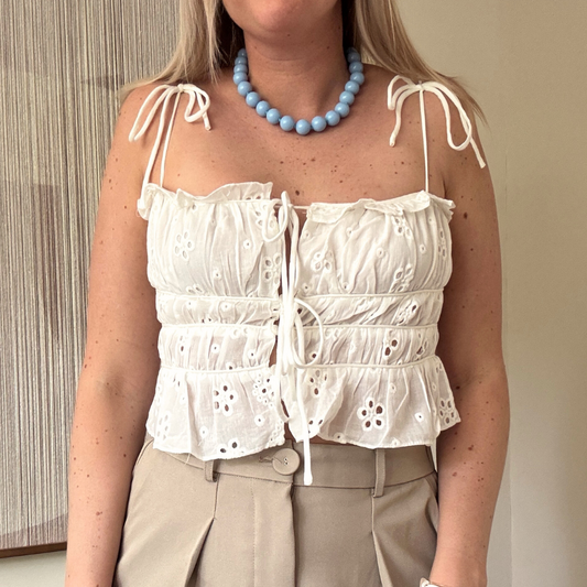 Beachy top met strikjes