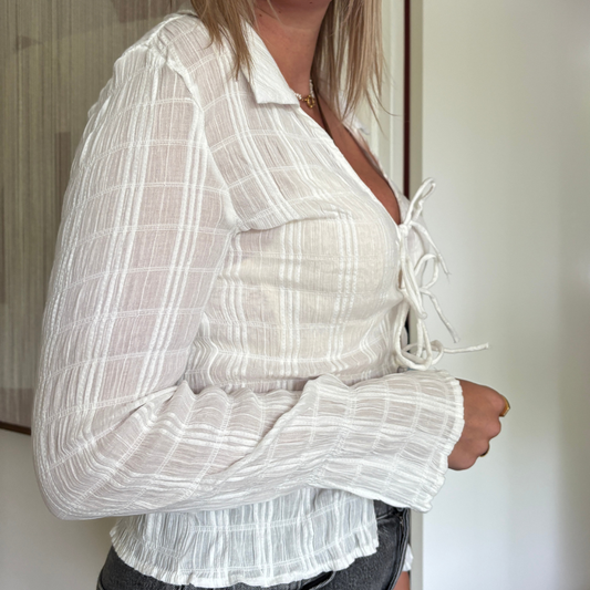 Ruffle top met strikjes
